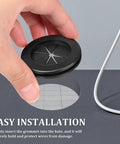 Six Pack Rubber Wire Grommet Kit With Dual Sided Design For Wear Resistant Organized Cable Management And Easy Desk Hole Covers For Home Office Wire Protection And Cord Management black rubber desk grommet being installed in tabletop hole