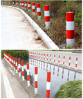 Gotta Have These Rock Solid Steel Traffic Cones And Parking Bollards, High Visibility Reflective Road Barrier Posts For Driveway Protection, Easy Setup 24 Inch Safety Markers Built Tough along a winding road and near a water body.