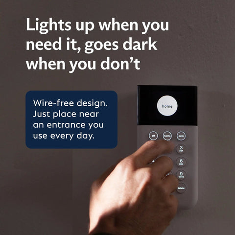 User interacting with 5 Piece Wireless Home Security System With Optional 24 Seven Pro Monitoring No Contract Plug And Play Setup Compatible With Alexa And Google Assistant White keypad device.