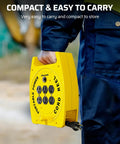 Person holding 30 Ft Retractable Extension Cord Reel with 4 Grounded Outlets, Easy Hand Wind No Fuss Design