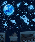 Glow In The Dark Stars Ceiling Set With Moon And Space Wall Decals For Kid Friendly Bedroom Decor Galaxy Planets Sticker Pack Includes 530 Pieces For Nursery And Birthday Party Favors Creating A Real Night Sky Vibe showing moon, stars, and astronaut design