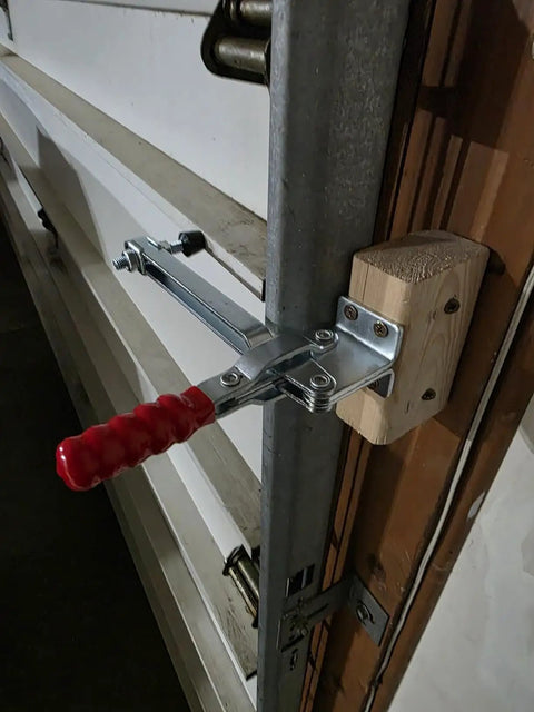 Pro Grade Vertical Toggle Clamp Featuring A Quick Release Lever And Unmatched 400 Lbs Holding Capacity For Rock Solid Workshop Clamping And No Sweat Assembly Jobs mounted on wood with red handle