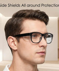 Heavy Duty Shop Ready Anti Fog Safety Glasses Featuring Rock Solid Side Shields And Easy Adjust Temples Clear Eye Protection For Hard Hats And Daily Grind Work worn by a man showing side shields.