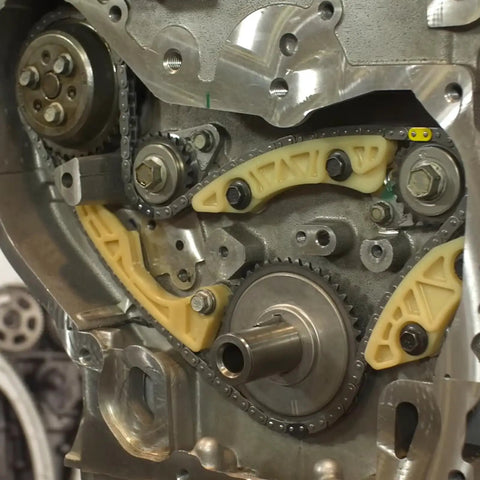 Timing Chain Kit Water Pump With VCT Solenoid Actuator Gear For 2.4L GM Engines close-up showing chain and gear components.