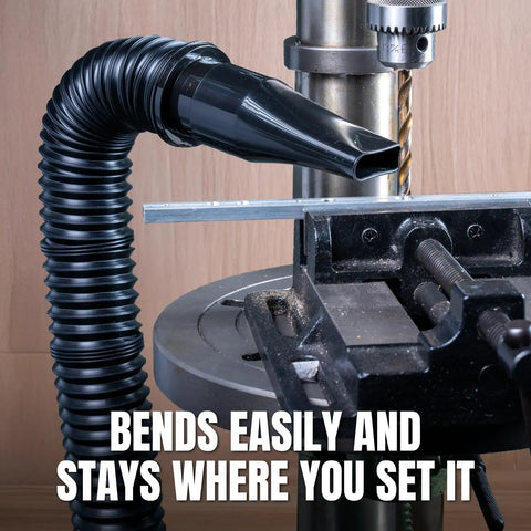 Two And A Quarter Inch Dust Collection Flexible Hose Kit with oval nozzle attached to a drill press, black color.