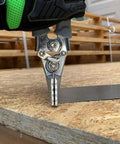 Sheet Metal Hand Seamer With 1/4 Inch Increment Marks shaping metal on wooden surface