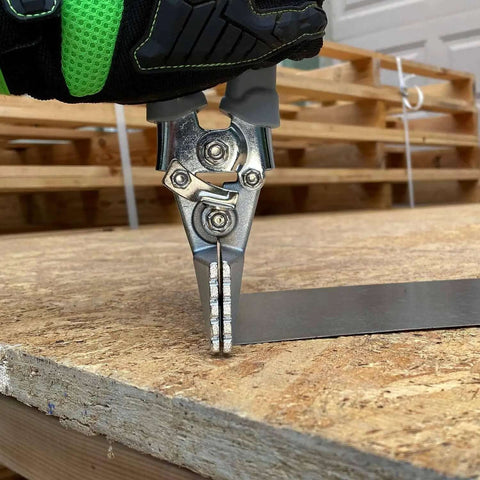 Sheet Metal Hand Seamer With 1/4 Inch Increment Marks shaping metal on wooden surface