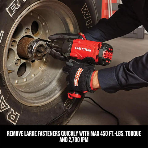 Half Inch Corded Impact Wrench, 7.5 Amp Power, 450 Ft Lbs Max Torque, 2700 IPM in use on vehicle tire for fastener removal