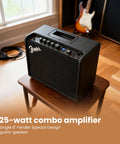 Mustang LT25 Guitar Combo Amp Bundle With Cable And Austin Bazaar Exclusive 12 Pack Picks on a wooden table