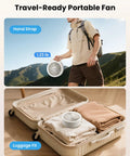 Foldable Desk Fan With LED Night Light 6.8 Inch Wireless Portable Fan shown hand-held and fitting in suitcase with luggage