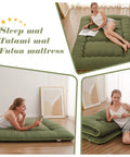 Japanese Floor Mattress Twin Roll Up Futon With Portable Storage Bag And Washable Cover Thick Tatami Mat in green, used for lounging.