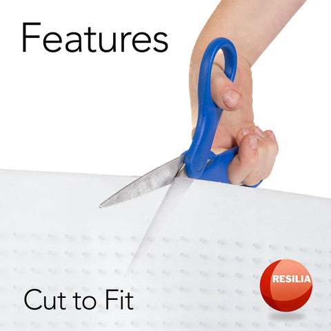 Beefed Up Crosshatch Carpet Runner And Rug Protector Mat That Blocks Spills Quick And Kills Slip Hazards With Waterproof Clear Vinyl Floor Covering For Deep Pile Carpets being cut with scissors for customization.