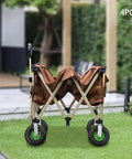 10 Inch Pneumatic Caster Wheels 4 Pack Rubber Air Tires Galvanized Brackets Heavy Duty Industrial Lawn Garden Cart Replacement Tough As Nails Rolling Gear For Wheelbarrows And Trailers Haul Loads Without A Hitch on a folding cart in a garden.