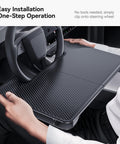 Person installing 2 In 1 Car Steering Wheel Desk Tray And Seat Gap Filler Organizer Foldable Carbon Fiber Look Table For Laptop Meals