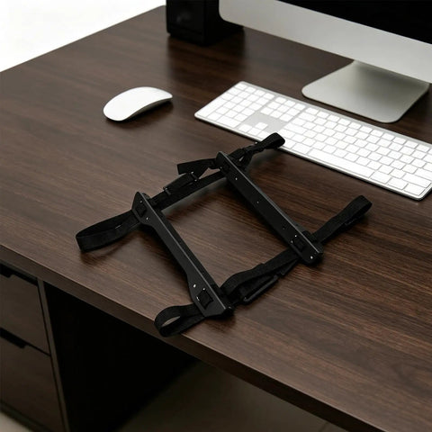 Game Changer Under Desk Computer Tower Stand For PC Hanging Bracket With Quick Lock Strap on a desk surface, ready for use.