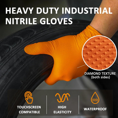 Orange nitrile glove with diamond texture on both sides, worn on hand gripping tire; large size.