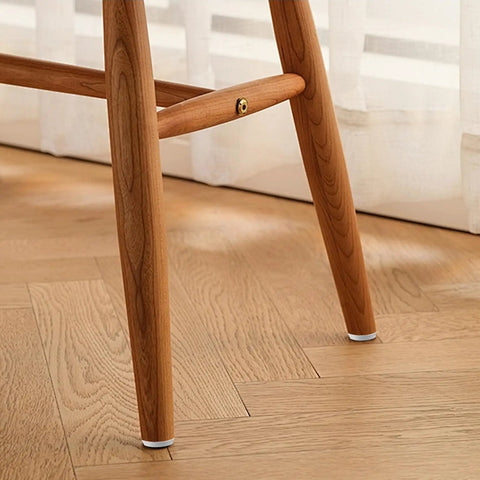Rock Solid White Furniture Levelers 16 Pack M6 X 18mm Thread Table Leg Adjustable Feet 23mm Base Plastic Glides on wooden chair leg.
