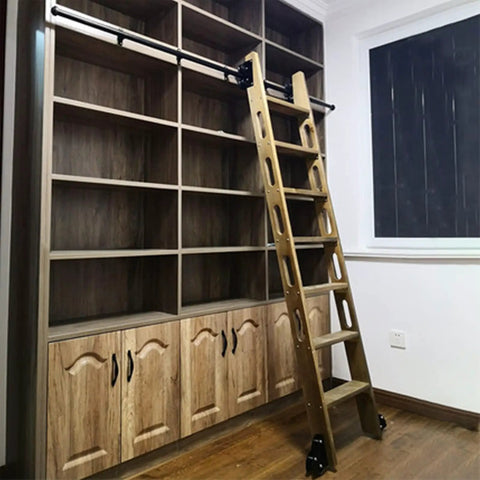 Straight Up Built Tough Black Steel Round Tube Escalator Rolling Ladder Track With Floor Casters Solid Complete Hardware Kit For Library Barn Door Slide Installations Six Point Six Foot Rail Set mounted beside wooden shelves.