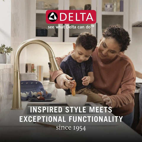 Parent and child using Delta faucet in modern kitchen setting