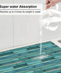Cyan Wood Grain Dish Drying Mat for Kitchen Counter with Ultra Absorbent Microfiber Surface getting water poured to show absorption.