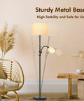 Cozy Living Room Floor Lamp With Linen Shade Tall Reading Light Black Matte Pole Lamp With 12W LED Bulb 3 Way Rotary Switch Modern Corner Lamp For Bedroom Or Study White Finish in a living room setting with sturdy base and soft glow