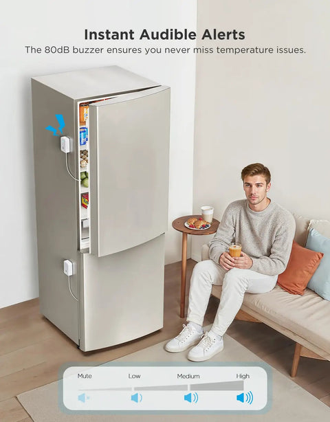 WiFi Refrigerator Thermometer With Alarm, 2 Pack, Remote Temperature Monitoring via App on modern fridge next to seated man