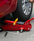 Camper Crank Handle Replacement For RV Trailer Jack Sockets Hand Crank Rocker shown next to a car with a red jack in use