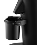 Dope Single Dose Electric Coffee Grinder Featuring 64Mm Titanium Flat Burrs And Stepless Adjustment To Nail Your Flavor Packed Espresso Routine In Sleek Black Finish close-up of the grind container.