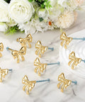 Dang Stylish Gold Bow Cabinet Handles Eight Pack Plus Heavy Duty Screws Easy Install Drawer Knobs on marble surface.
