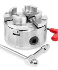 Close-up of 3.75 Inch 4-Jaw Self-Centering Lathe Chuck Set with 1-Inch By 8TPI Thread, including red key and accessories.