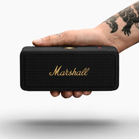 Emberton II Portable Bluetooth Speaker With 360 Degree True Stereophonic Sound, compact in hand, rugged black and brass finish