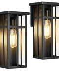 Kick It Up A Notch On The Patio With Modern Cross Frame Outdoor Wall Light Fixtures Boasting Matte Black Frames And Clear Glass Porch Lanterns For Straight Up Stellar Exterior Vibes - two matte black wall lights with clear glass.
