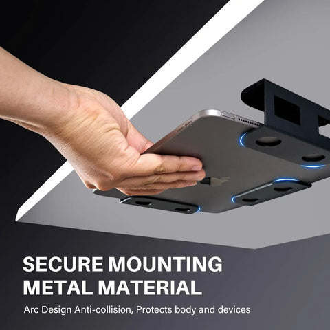 Person installing a laptop on the Prime Desk Real Estate Saver under desk mount made of solid steel for secure placement.
