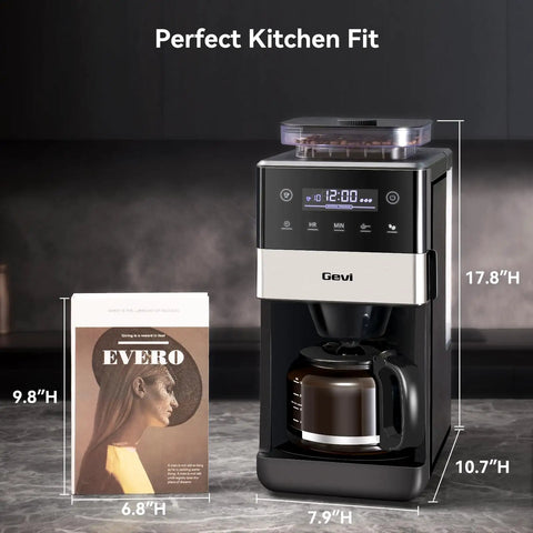 10 Cup Grind And Brew Coffee Maker Featuring A Sleek Touch Display, Programmable Schedule, Custom Grind Levels, Smooth Sip Keep Warm, And Hassle Free Set It Forget It Automation For Daily Caffeine Cravings next to a book on a kitchen countertop.