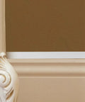 Self Adhesive Cable Raceway Pvc Cord Cover Peel And Stick Wire Organizer for hiding cords on a wall with ornate trim.