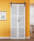 Experience effortless privacy and style with a paintable 36 by 84 inch bifold barn door featuring fingerprint resistant solid core MDF panels and 3 lite frosted glass for privacy, no assembly required for pantry and laundry areas.