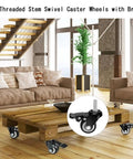 Heavy Duty Silent Polyurethane Swivel Caster Wheels With Threaded Stem And Dual Locking Brakes on a furniture setup in a living room.