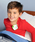 Award Winning Bedwetting Alarm For Kids And Deep Sleepers With Loud Tones And Strong Vibes Doctor Recommended Pediatric System That Cycles Through Five Alarm Sounds For Faster Nighttime Dryness on a smiling child in bed