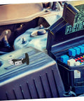 Rubber Hood Latch Kit With Flexible T Handle Hasps for toolboxes shown in an open vehicle engine bay.