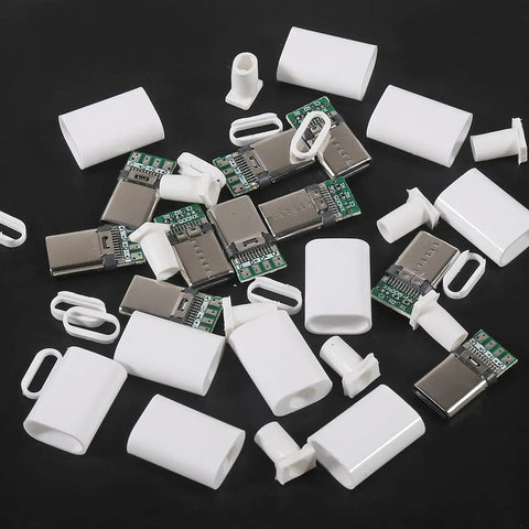USB 3.1 Type C 24-Pin Male Plug Socket Receptacle For Soldering Wires And Cables, scattered components, white plastic and metal build.