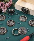 Antique Bronze Drawer Pull Ring Set 8 Pack 2.2 Inch Alloy Cabinet Knobs with screws and tools displayed on a table