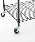 Heavy Duty 2 Inch Caster Wheels With 1/4-20 Threaded Stem Set Of 4 Durable Badass Rubber Treads For Slick Rolling On Wire Shelving Utility Carts And Shop Gear on a wire shelf.