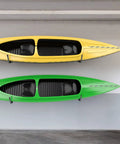 Lightweight Kayak Storage Rack With Wall Mount Hooks For Garage Organization Perfect For Kayaks Paddle Boards Surfboards Canoes Snowboards Ladders And More Space Saver Includes Four Hooks And Fasteners holding yellow and green kayaks