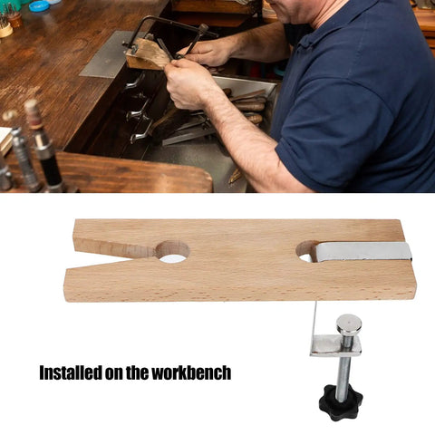 Wooden Jewelers Bench Pin With Heavy Duty C Clamp Slotted Jewelry Work Holder for ring polishing shown on a workbench
