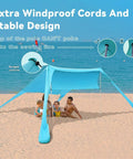 Portable Beach Tent Sun Shelter 7x7ft Shade Canopy UPF50 Sandbags wind-resistant with family on beach, ocean backdrop