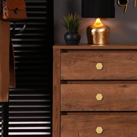 Wooden dresser with 1-1/10 Inch Solid Brass Knob And Pull Set For Cabinets And Drawers, Brushed Gold Hexagon Handles installed.