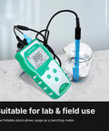 Value Series Pro Grade Portable Handheld pH Meter Kit With Auto Calibration on lab table, measuring pH in a beaker