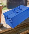Badass Blue Iron Double Layer Toolbox Organizer With Grip Carry Handle Portable Heavy Duty Build For Garage Setup Or Job Site Grind To Keep Tools Locked In on wooden surface.