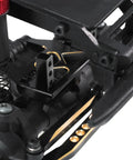 Close-up of Brass Servo Mount Upgrade for Redcat Ascent-18 1/18 RC Crawler, showing bolt-on fitting and brass weight.