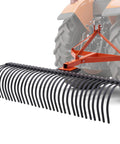 3 Point Tow Behind Rake With 60 Inch Width And 32 Steel Tines, adjustable angle, attached to tractor, front view